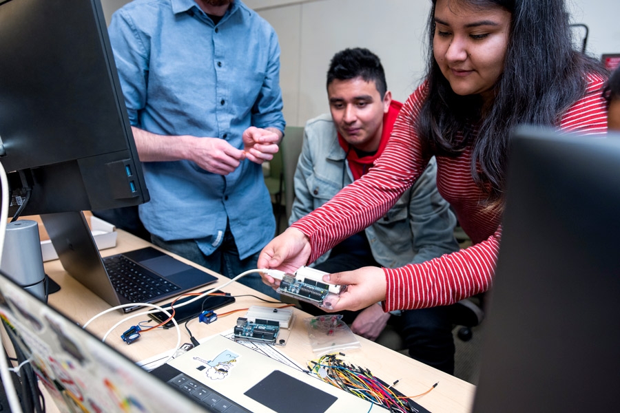 Students working with computer parts